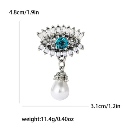 Broche Ojo del Diablo – Esmalte Vintage Estilo Palace | Pendientes y Anillos Unisex