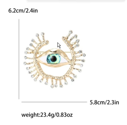 Broche Ojo del Diablo – Esmalte Vintage Estilo Palace | Pendientes y Anillos Unisex